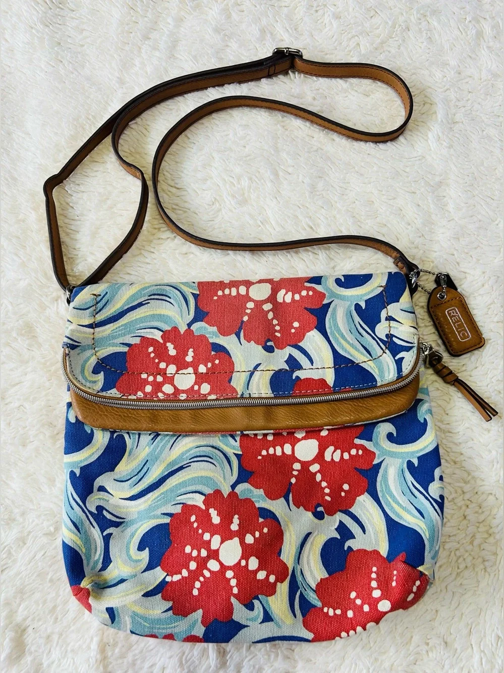 Relic floral canvas Crossbody handbag adjustable strap with a fold-over flap